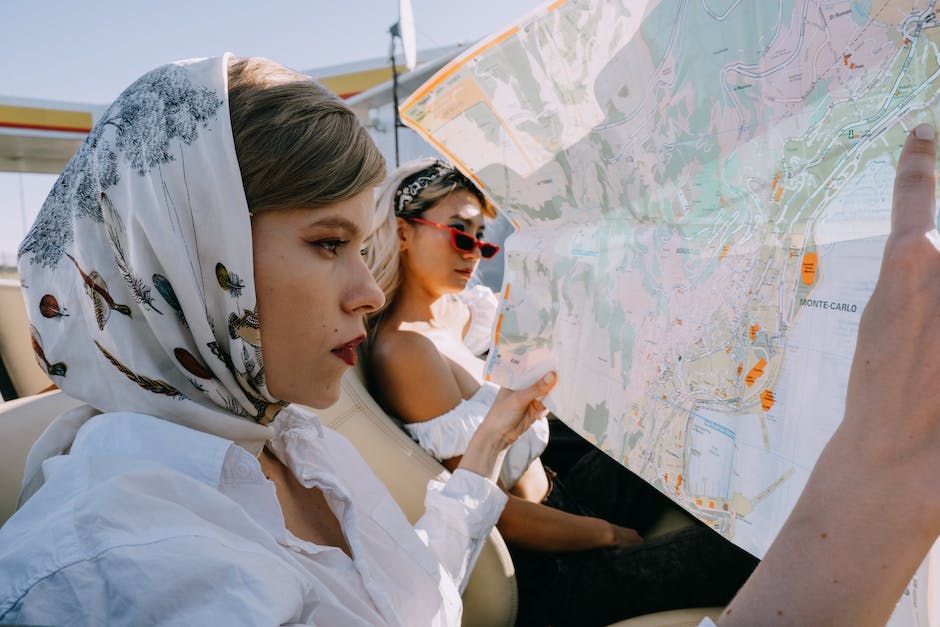 An image of a person interacting with a map on a touchscreen device, showcasing the immersive and interactive experience of interactive maps.